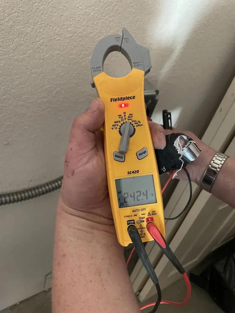 Voltage testing with clamp meter during Circuit Breaker Repair in Trotwood